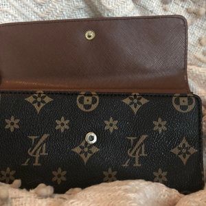 Bags - Medium Brown Wallet. Logo Print. Bags - Medium Brown Wallet. Logo Print.